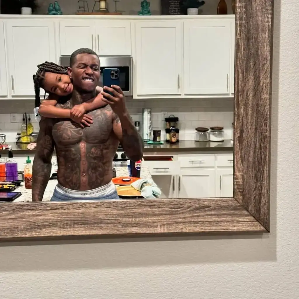 Haiti Babii with his daughter